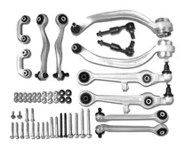 FUHRLENK suspension kit laid out on white: upper and lower control arms, tie rod ends, stabiliser links, bolts and nuts
